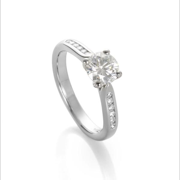 Platinum single stone diamond ring with diamond set shoulders from Thorntons jewellers Kettering Northampton