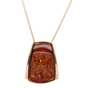 Sally Thorntons Jewellery blog on Amber from AA Thornton Jeweller Kettering Northampton Gold plated pendulum congnac amber pendant on snake neckle £179 our ref 100541