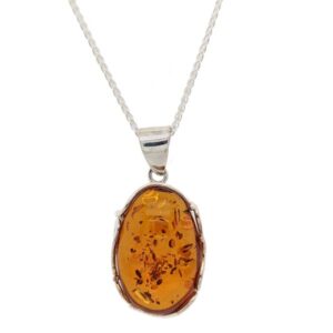 Sally Thorntons Jewellery blog on Amber from AA Thornton Jeweller Kettering Northampton Oval silver scalloped amber pendant on chain £93 our ref 100539