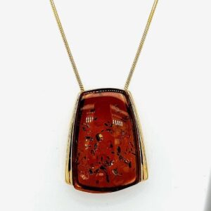 Modern congnac amber pendant on snake necklet