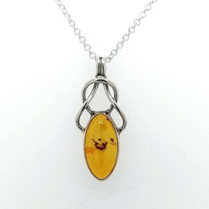 Small oval amber silver celtic pendant