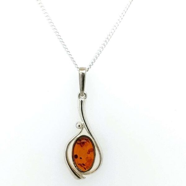Small oval amber & silver open bead pendant